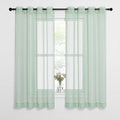 NICETOWN Sheer Curtains for Bedroom Windows, Grommet Top Voile Sheer Country Style Curtain Drapes Light and Airy Drapes for Children Room/Nursery, Sage Green, W54 x L63, 1 Pair